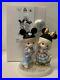 Precious_Moments_Walt_Disney_World_50th_Couple_with_Mickey_Ears_Hats_Figurine_01_vu